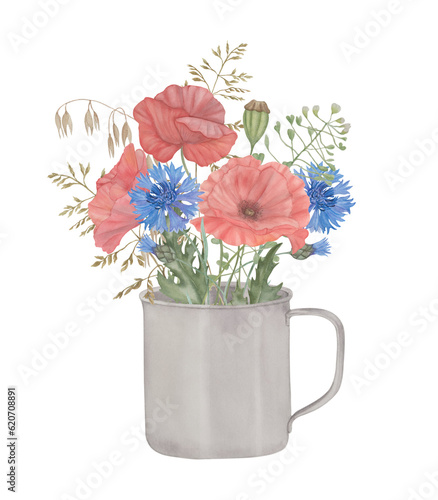 Bouquet of wild herbs  cornflowers and poppies in a metal cup