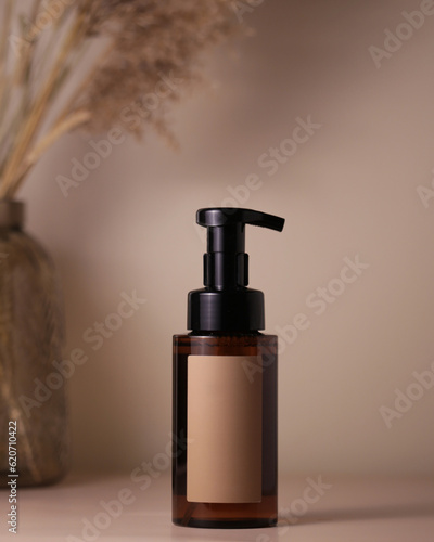 brown bottle with cosmetic product