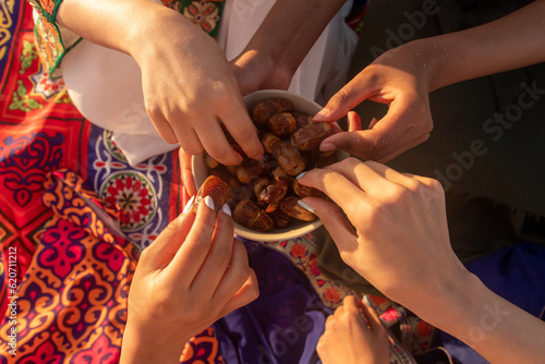 Friends Breaking Fast Together with Dates