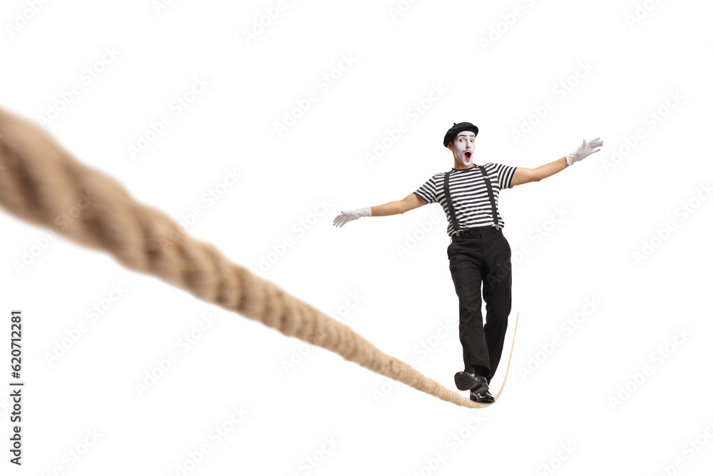 Excited mime walking on a tightrope