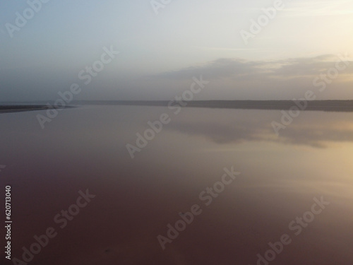 Pink Koyashskoye salt lake in Krym and Black Sea coast. Aerial view.
