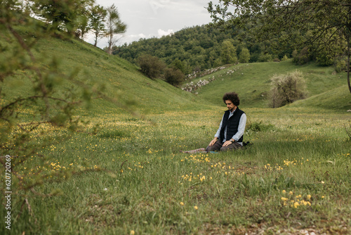 man praying salah in nature photo