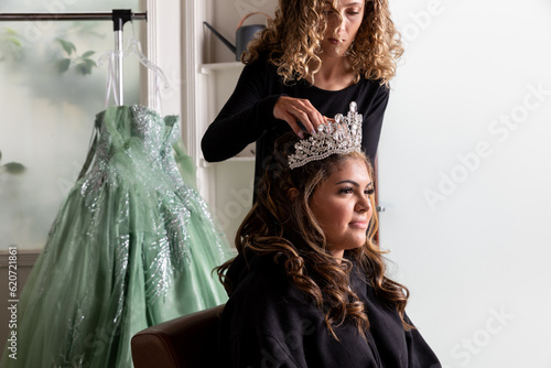 A Girl and Her Stylist Preparing for her Quinceanera