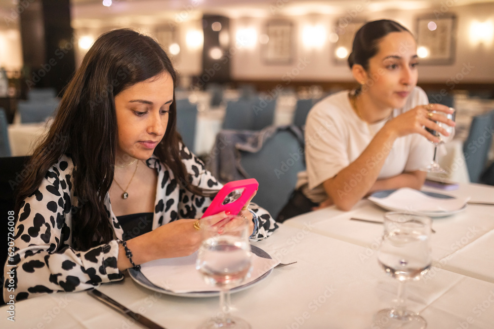 young friends in restaurant