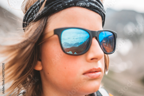 rocky mountains reflection in sunglasses photo