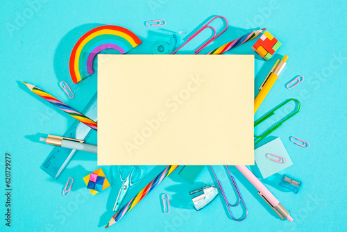 School supplies with a blank paper for mock up photo