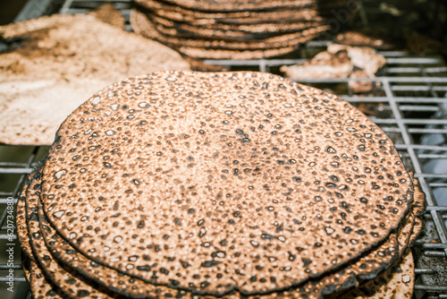 Handcrafted Shmurah Matzah In a Hasidic Bakery. photo