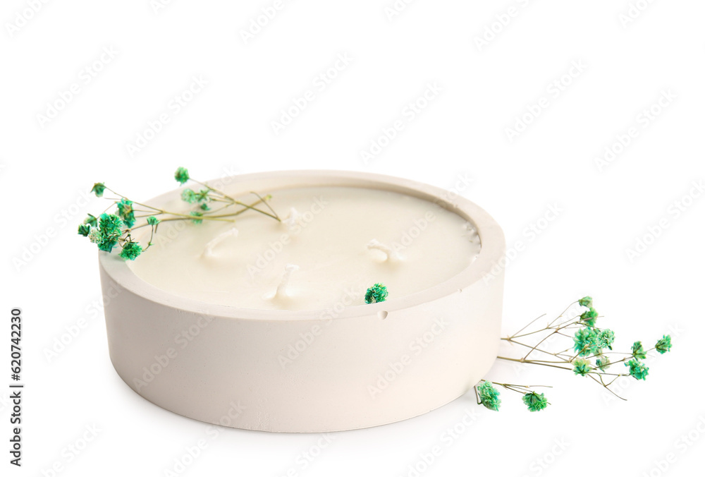Holder with candle and gypsophila flowers on white background Holder with candle and gypsophila flowers on white background