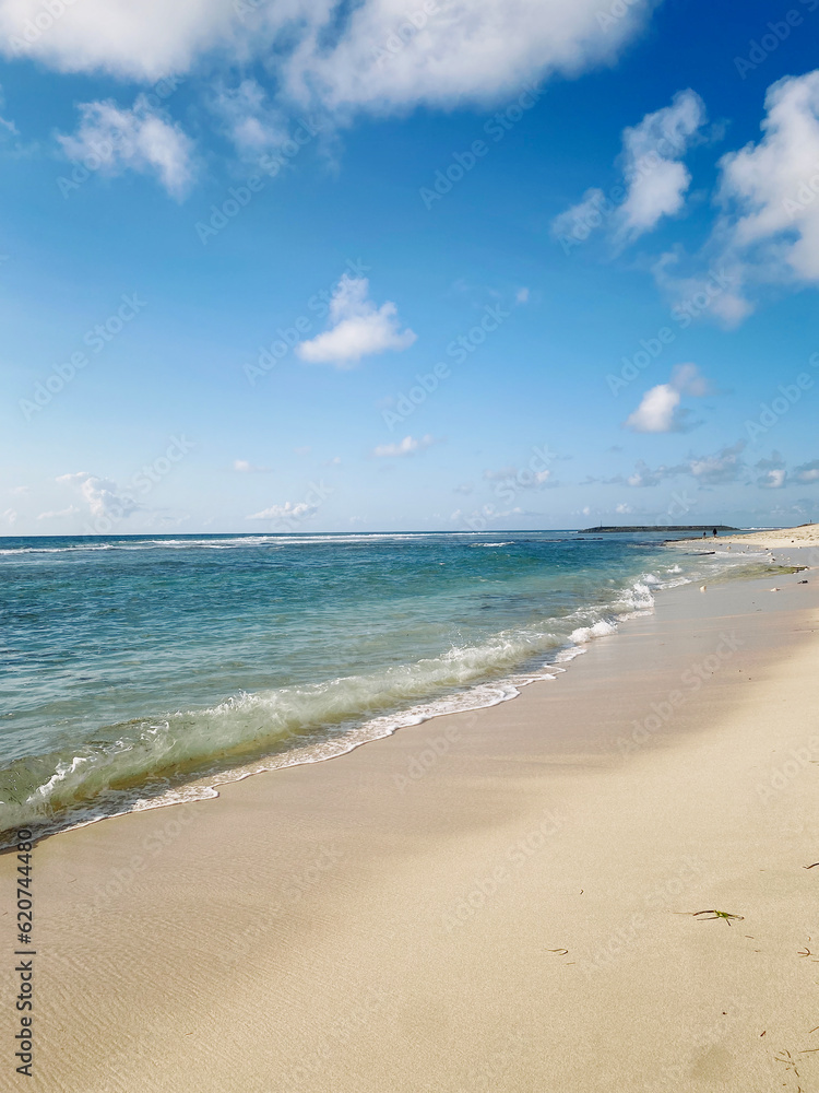Beautiful bali beach in sunny day with cloudy sky Beautiful bali beach in sunny day with cloudy sky