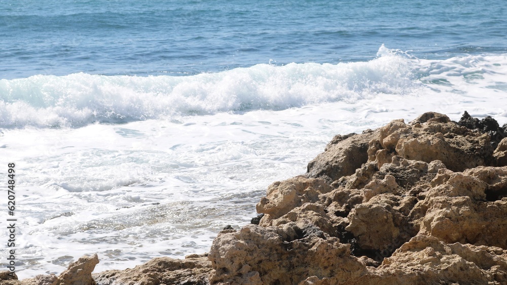 Fototapeta premium Sea waves at rocky coast