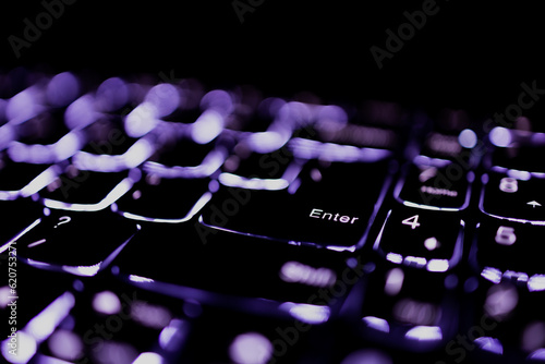 Backlit keyboard detail focusing Enter Key photo