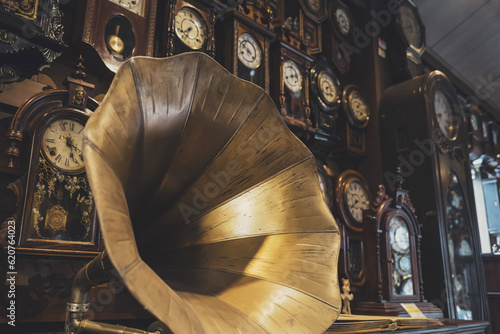 Gramophone and many old wall clocks