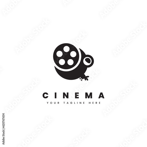 Cinema logo. Illustration of a bird eating a foll film, for cinema logo or show logo. photo