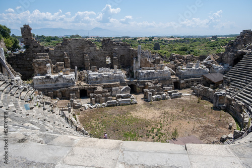Side Ancient theatre. Turkey. Antalya. Ruins of the ancient city of Side. The largest amphitheater in Turkey. Main street of the ancient city. Mediterranean Sea.