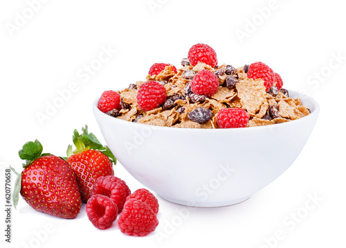 Bowl of bran flakes with raisins and raspberries