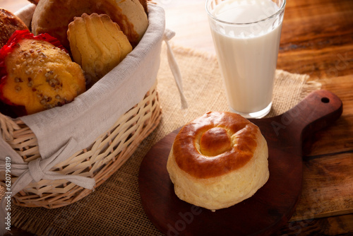 Bisquet. Also known as Bisquets Chinos, it is one of the traditional breads in Mexico, commonly consumed hot, cut in half and spread with butter and fruit jam. photo