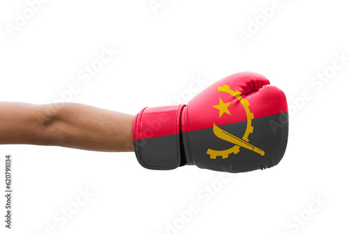 3D Flag of Angola on a boxing gloves. © dsom