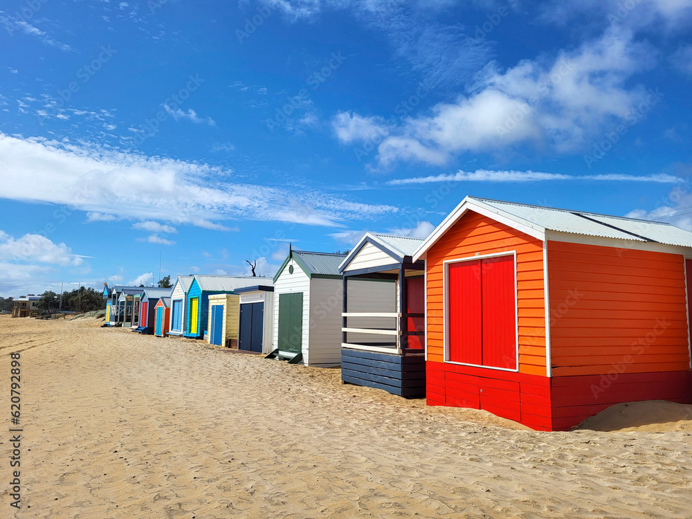 Bright colourful beach huts At Mount Marth on Mornington Peninsular. The bathing boxes are very expensive and are very rarely for sale. There are over 1000 huts on the peninsula from Rosebud to Mount Bright colourful beach huts At Mount Marth on Mornington Peninsular. The bathing boxes are very expensive and are very rarely for sale. There are over 1000 huts on the peninsula from Rosebud to Mount