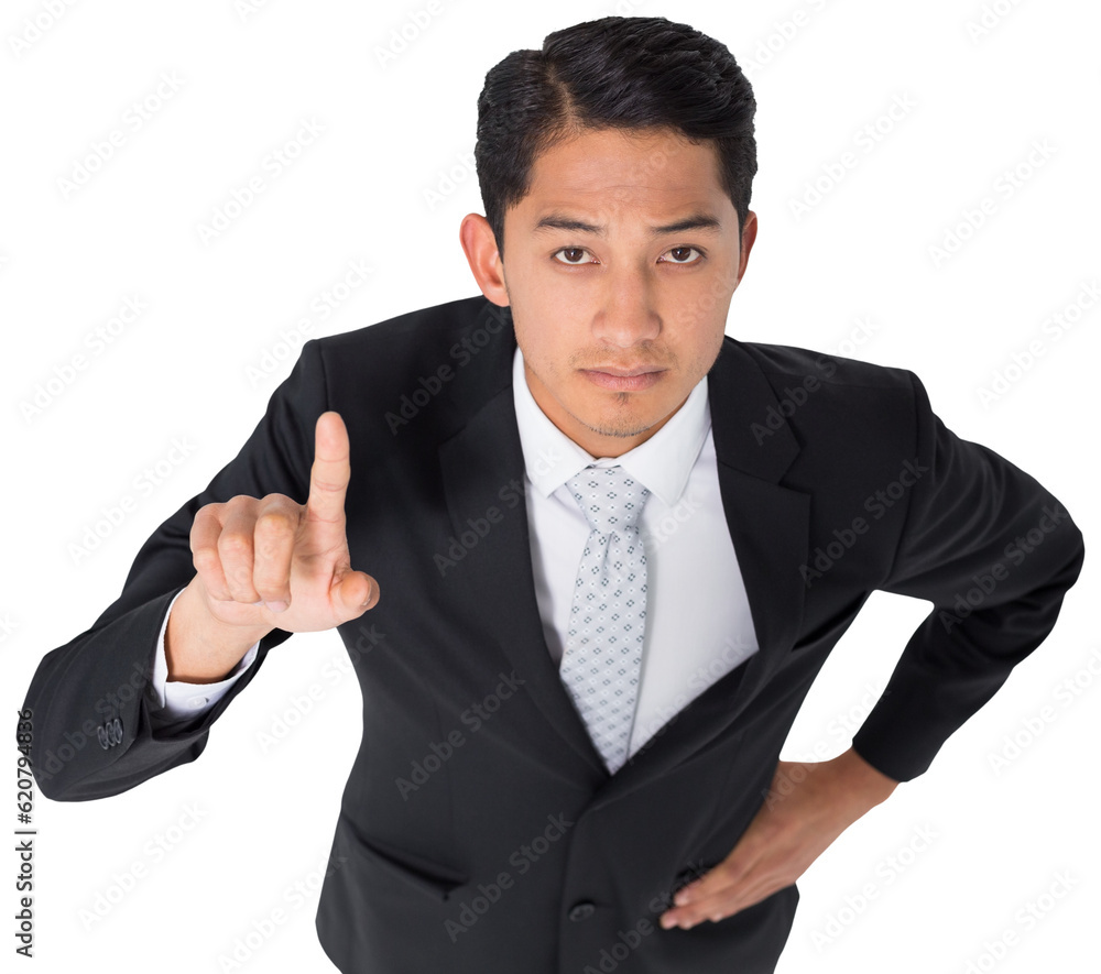 Digital png photo of serious asian businessman pointing with finger on transparent background Digital png photo of serious asian businessman pointing with finger on transparent background