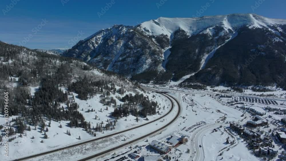 Drone aerial Copper Mountain Woodward winter ski snowboard resort half pipe training Colorado crisp cold early morning fresh snow i25 car traffic highway lodging cinematic forward pan up motion 4k Drone aerial Copper Mountain Woodward winter ski snowboard resort half pipe training Colorado crisp cold early morning fresh snow i25 car traffic highway lodging cinematic forward pan up motion 4k