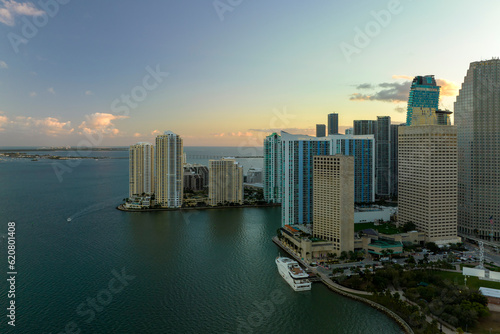 Aerial view of downtown district of of Miami Brickell in Florida, USA at sunset. High commercial and residential skyscraper buildings in modern american megapolis