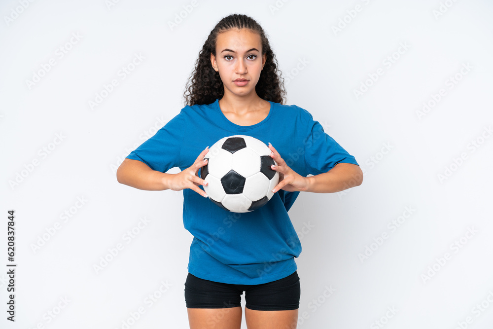 Young woman isolated on white background with soccer ball