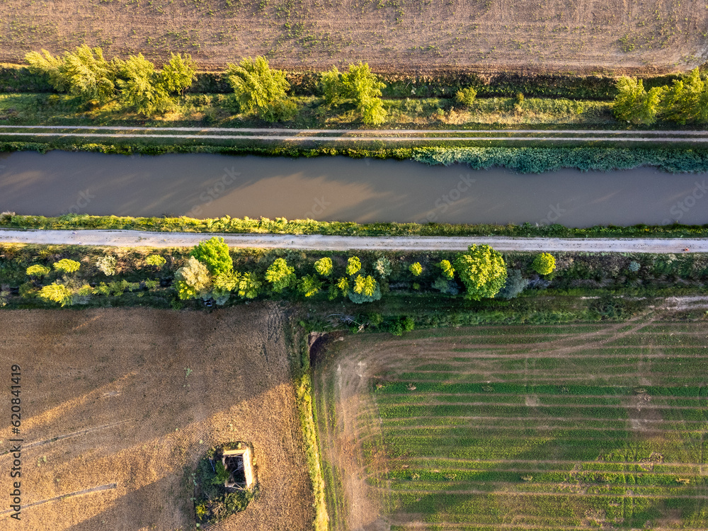 Enchanting Sunrise Over the Scenic Canal de Castilla: An Aerial Perspective