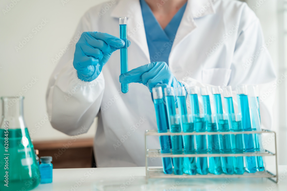 Medical test vaccine research and development concept. Scientist in laboratory study and analyze scientific sample of antibody. Medical test vaccine research and development concept. Scientist in laboratory study and analyze scientific sample of antibody.