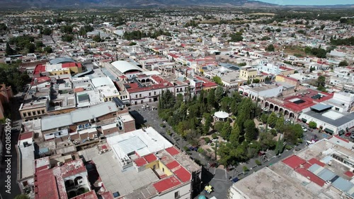 Drone performs a semi-orbit capturing the view of Rafael Paez garden in Jerez, Zacatecas. photo