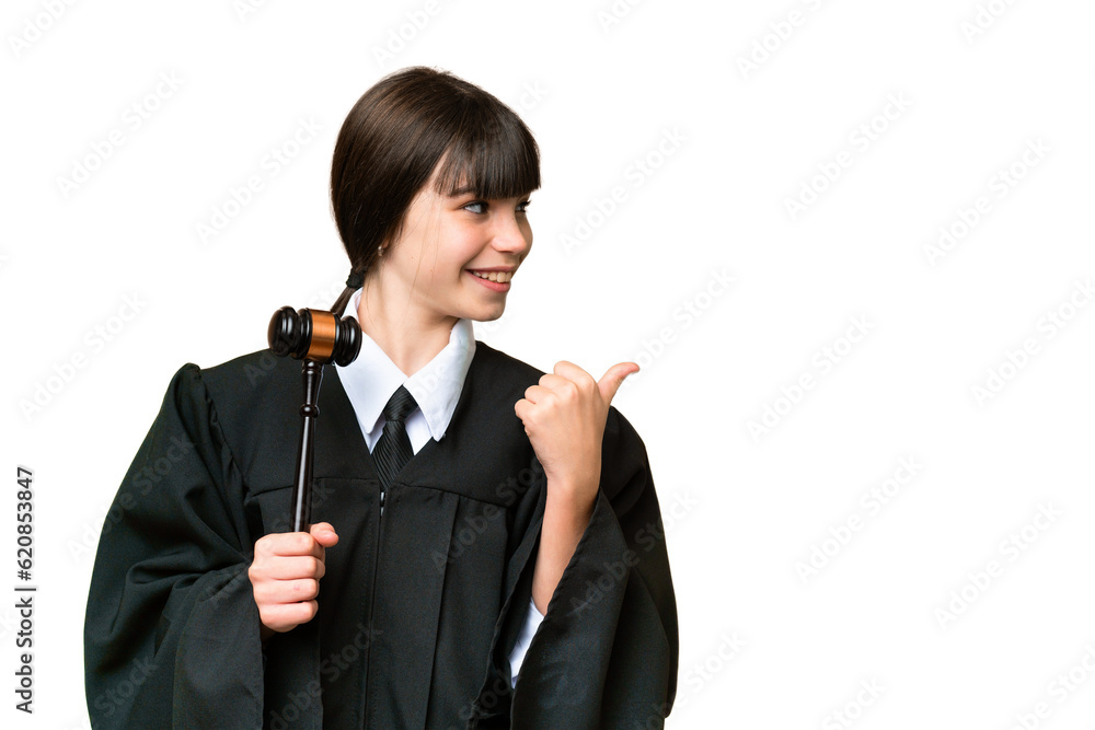 Little girl playing as a Judge over isolated background pointing to the side to present a product