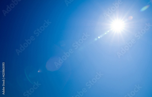 blue sky background with tiny clouds