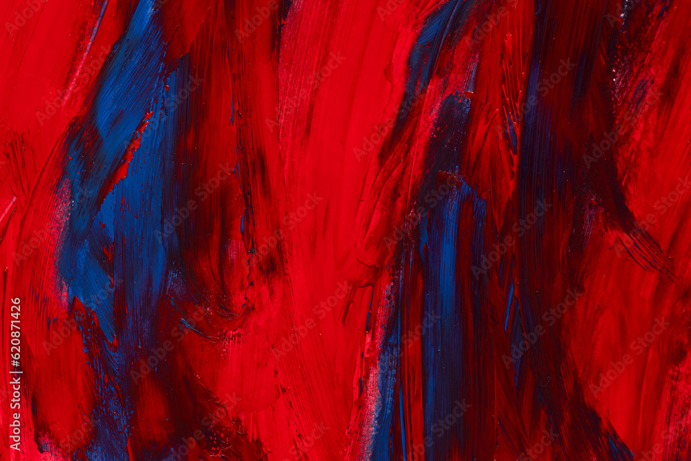 混ざる青色と赤色の絵具