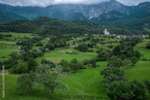Drežnica village, Slovenia. Drone aerial view. Picturesque rural green landscape