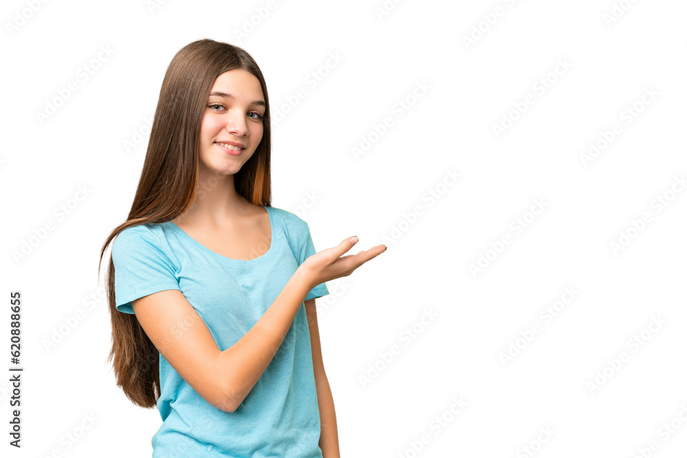 Teenager girl over isolated chroma key background presenting an idea while looking smiling towards Teenager girl over isolated chroma key background presenting an idea while looking smiling towards