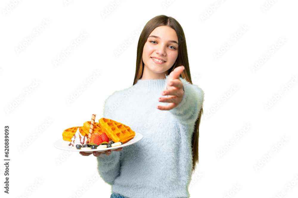 Teenager girl holding waffles over isolated chroma key background shaking hands for closing a good deal Teenager girl holding waffles over isolated chroma key background shaking hands for closing a good deal