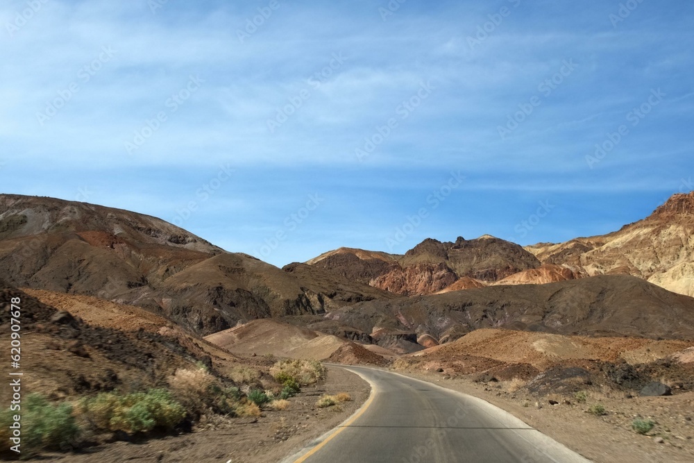 Desert Serenity: Panoramic View of an Empty Road Surrounded by Red Rock Canyon After a Storm, Presented in Captivating 4K Resolution Desert Serenity: Panoramic View of an Empty Road Surrounded by Red Rock Canyon After a Storm, Presented in Captivating 4K Resolution