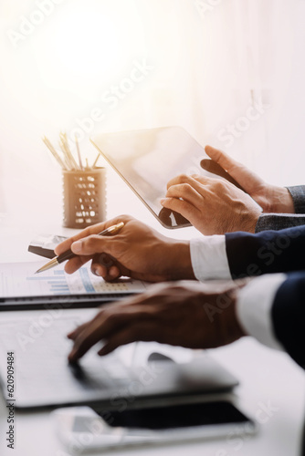 Canvas Print Businessman working on a laptop computer to document management online documentation database digital file storage system software records keeping database technology file access doc sharing