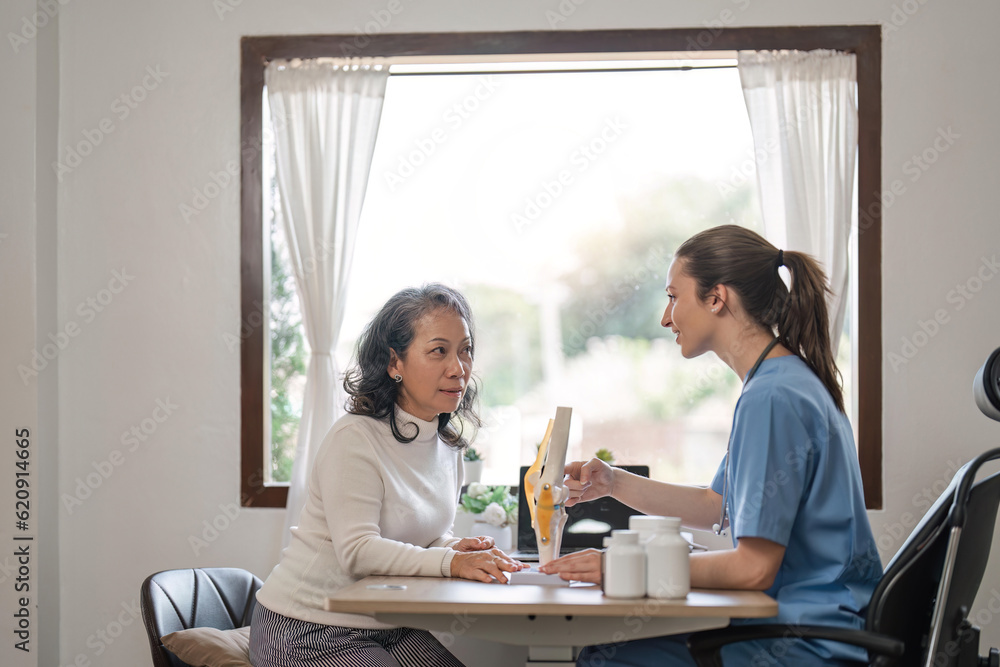 The doctor explained, giving consultations to senior patients The doctor explained, giving consultations to senior patients