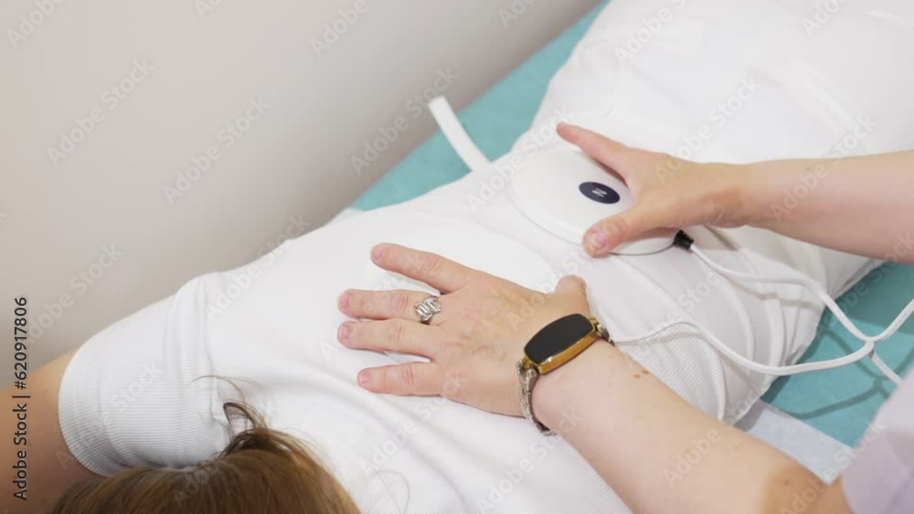 A patient on a magnetotherapy procedure. A patient on a magnetotherapy procedure.