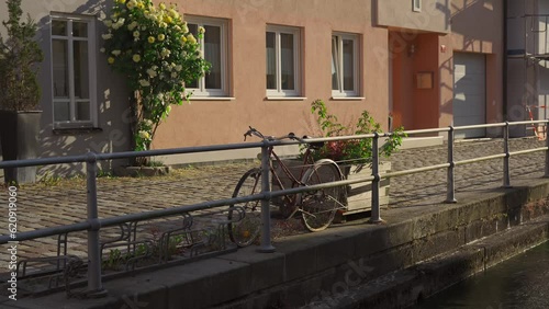 Wallpaper Mural Old historic town Freising and their canals on the River Isar in Bavaria, Germany. Freising is city in Deutschland, regional center, located in Bayern. Water canals in an ancient Eupropean city.  Torontodigital.ca