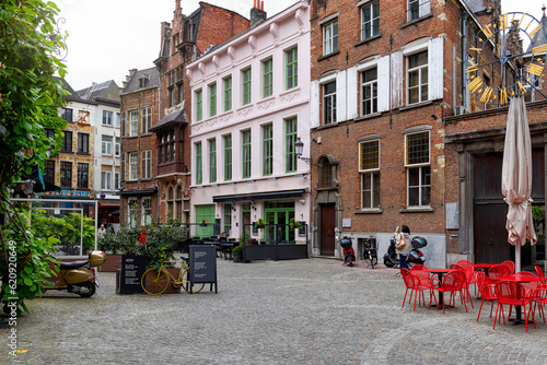 Old street with tables of cafe in historic city center of Antwerpen (Antwerp), Belgium. Cozy cityscape of Antwerp. Architecture and landmark of Antwerpen © Ekaterina Belova