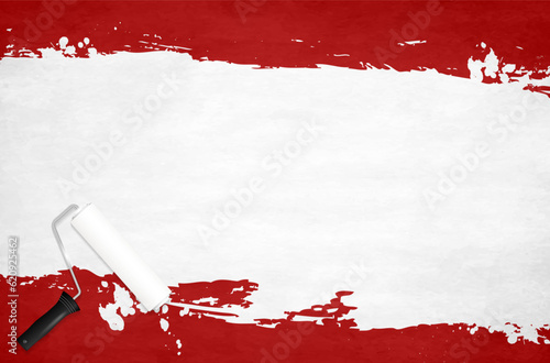 Paint roller and background of red and white paint splashes with texture