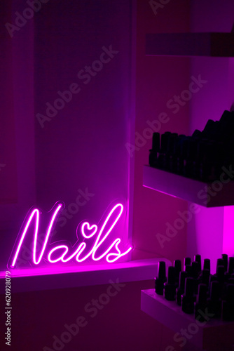 Pink neon sign nails. Trendy style. Beauty style. Neon sign. Custom neon. Beauty decor. photo