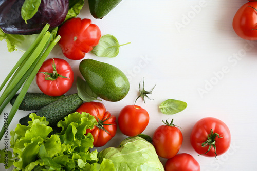 set of fresh vegetables on light surface