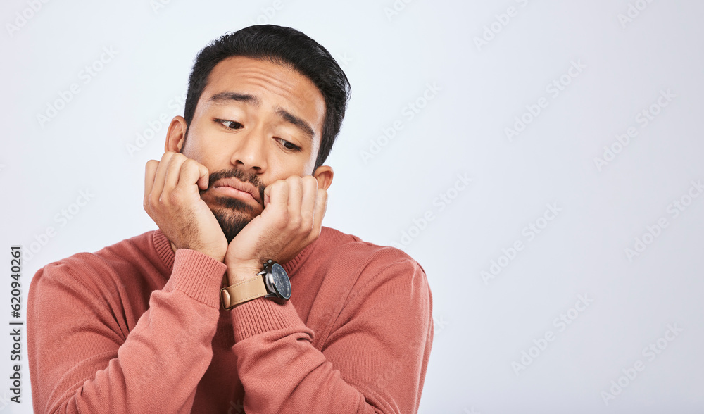 Thinking, depression and sad asian man in studio for stress or broken heart, lonely or bored on grey background. Doubt, fear and face of male with anxiety, grief or trauma and mental health crisis Thinking, depression and sad asian man in studio for stress or broken heart, lonely or bored on grey background. Doubt, fear and face of male with anxiety, grief or trauma and mental health crisis