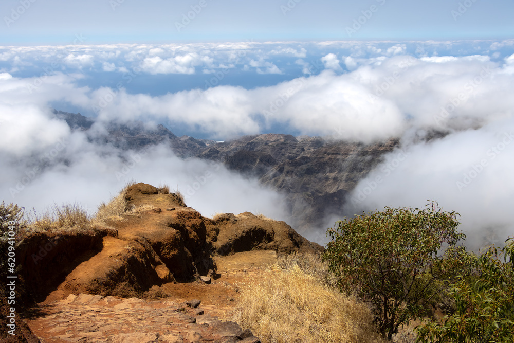 hiking path above the clouds down into Ribeira da Torre on Santo Antão in Cape Verde hiking path above the clouds down into Ribeira da Torre on Santo Antão in Cape Verde