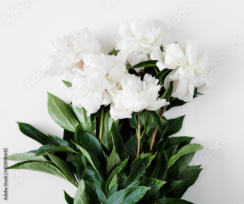 Top view of beautiful bouquet of white peonies
