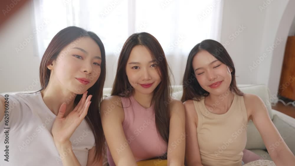 Three Asian Women friends having video call with smartphone Three Asian Women friends having video call with smartphone