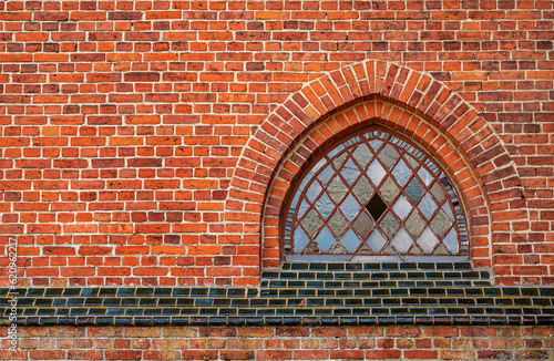 General view and architectural details of the Neo-Gothic Catholic Church of St. Joseph in Kobułty, Masuria, Poland.