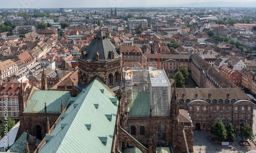 Strasbourg, France - 06 26 2023: Strasbourg cathedral: View of the roof of the cathedral and the city around from the top. photo